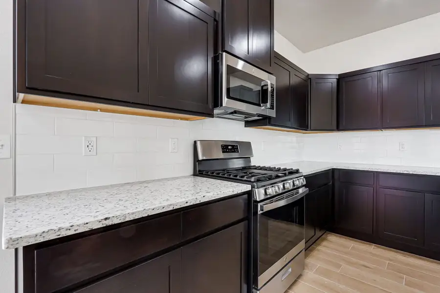 Furnished interior view inside a new home in Paseos Del Este, Horizon City (Image 7).