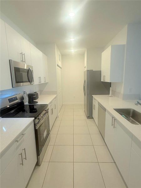 Furnished interior view inside a new home in , Dania Beach (Image 12).
