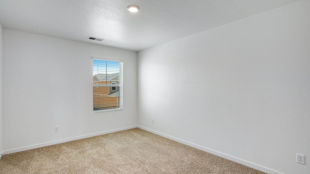 Spacious, unfurnished interior of a new home in Sky Ranch, Watkins (Image 17).