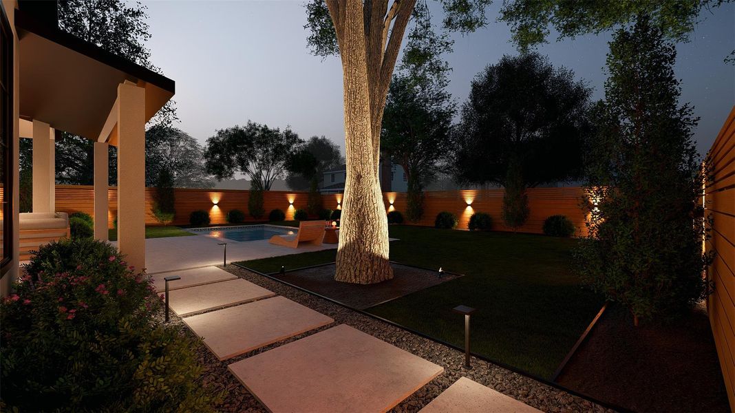 Illuminated pathways guide you through a private yard featuring a sparkling pool and a grand mature tree.