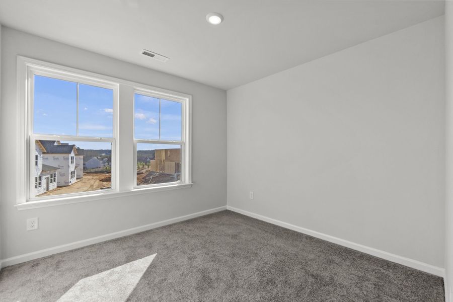 Spacious, unfurnished interior of a new home in The Coves on Lake Wylie, Charlotte (Image 19).