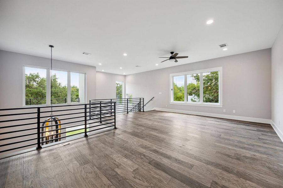 Upstairs Loft/Den with custom made metal railing Upstairs Loft/Den with custom made metal railing