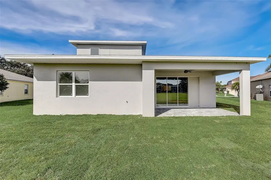 Exterior details and patio area of a home in , Apopka (Image 3).
