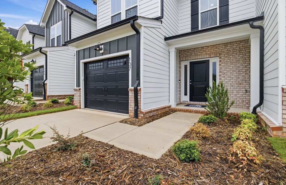 Exterior details and patio area of a home in Cambria, Garner (Image 3).