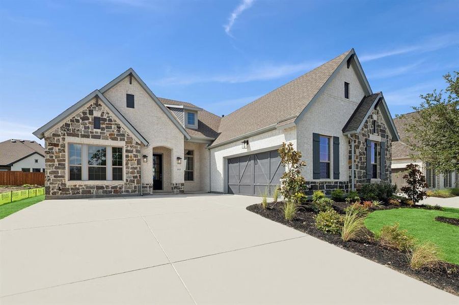 Front exterior of a new home in Terraces – Classics, Rockwall, TX, highlighting curb appeal (Image 2). Front exterior of a new home in Terraces – Classics, Rockwall, TX, highlighting curb appeal (Image 2).