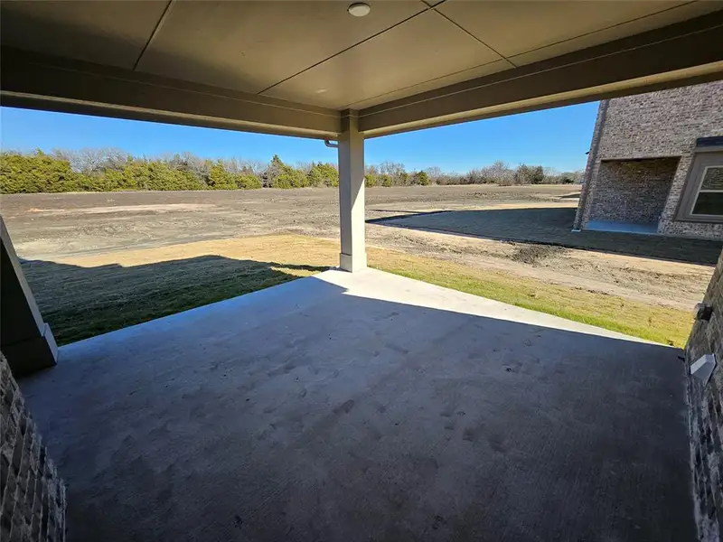 Exterior details and patio area of a home in Trails of Trenton, Trenton (Image 3).