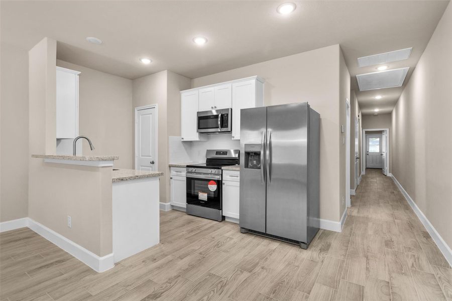 Furnished interior view inside a new home in , Willis (Image 14).