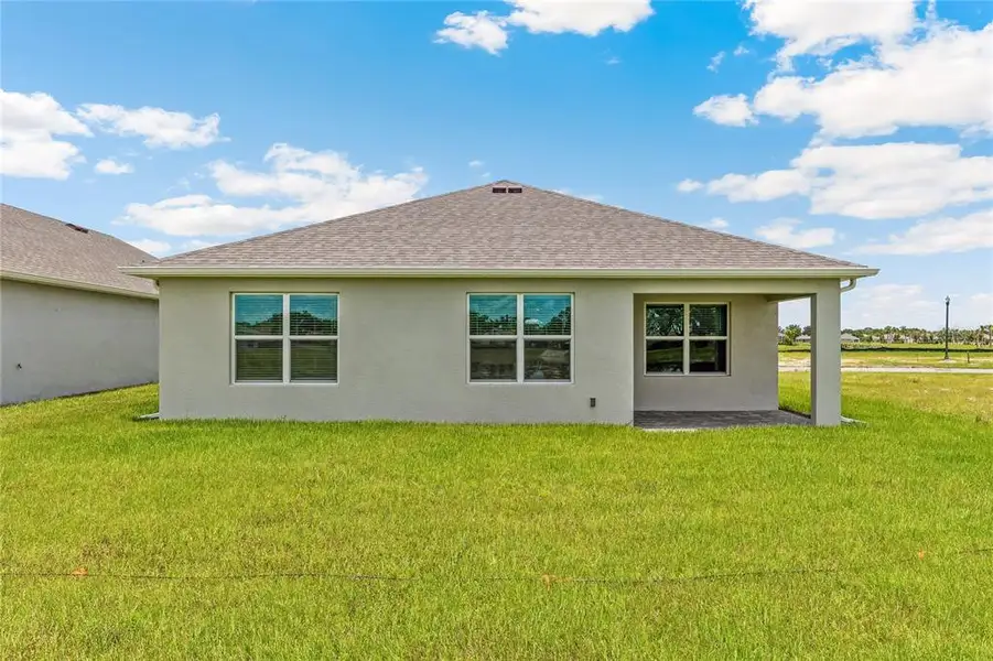 Exterior details and patio area of a home in Seagrass, Punta Gorda (Image 2).