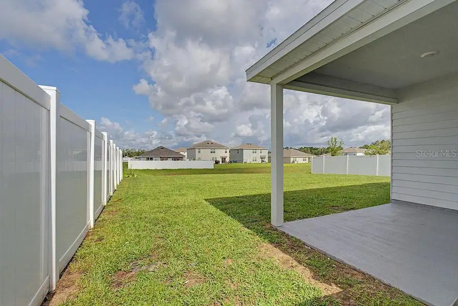 Exterior details and patio area of a home in , Alachua (Image 3).