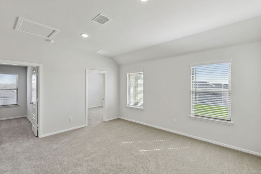 Bedroom in the Holden home plan by Trophy Signature Homes – REPRESENTATIVE PHOTO