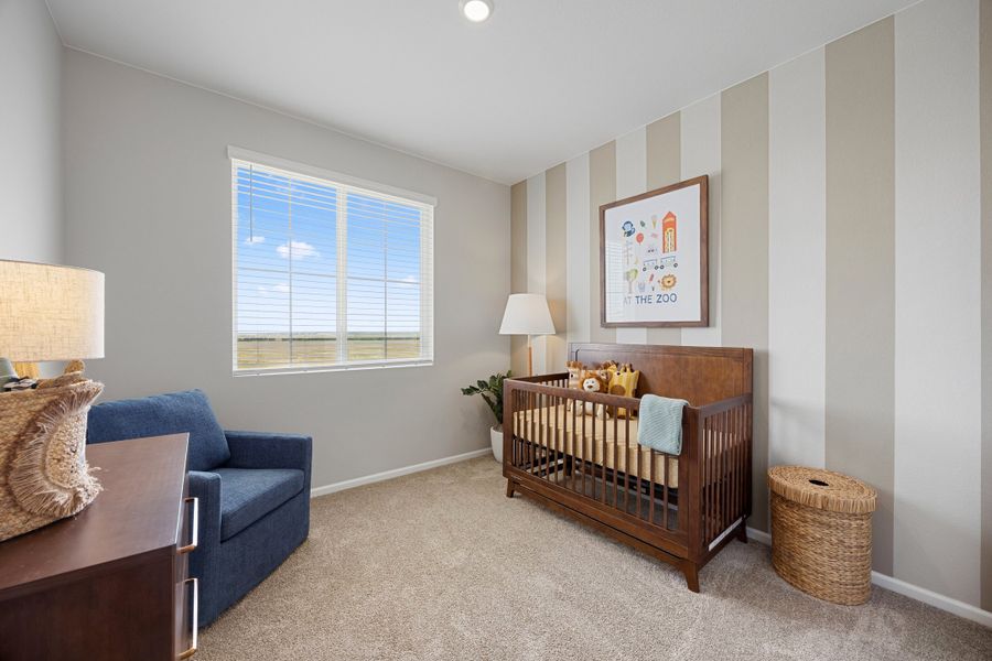Representative furnished interior of a home built from the 2504 by Risewell Homes in Harvest Crossing, Aurora (Image 17).