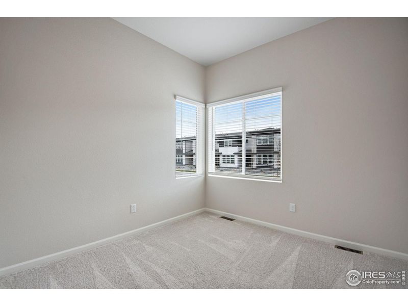 Spacious, unfurnished interior of a new home in Westside Crossing, Berthoud (Image 33).