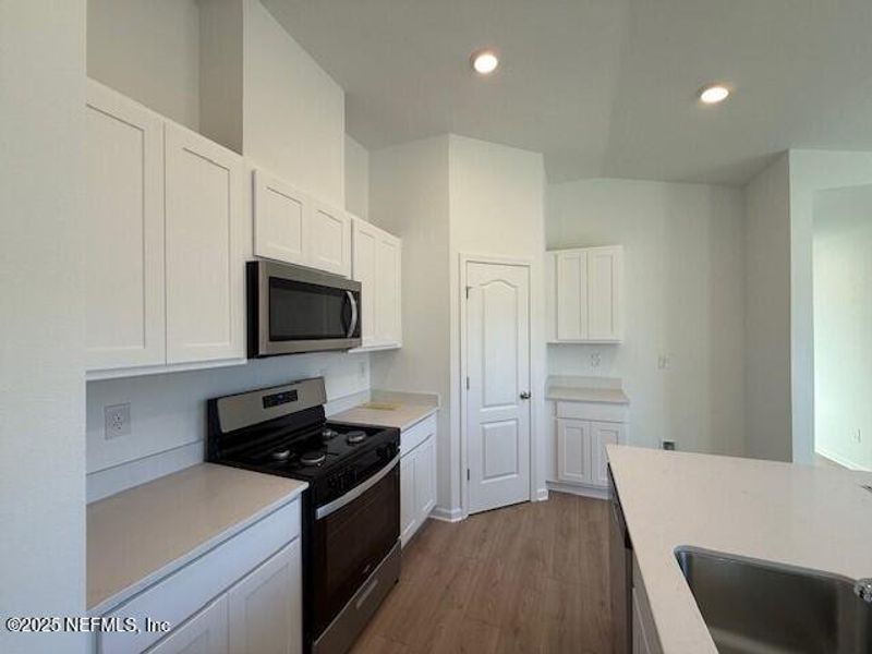 Furnished interior view inside a new home in Grand Reserve, Bunnell (Image 16).