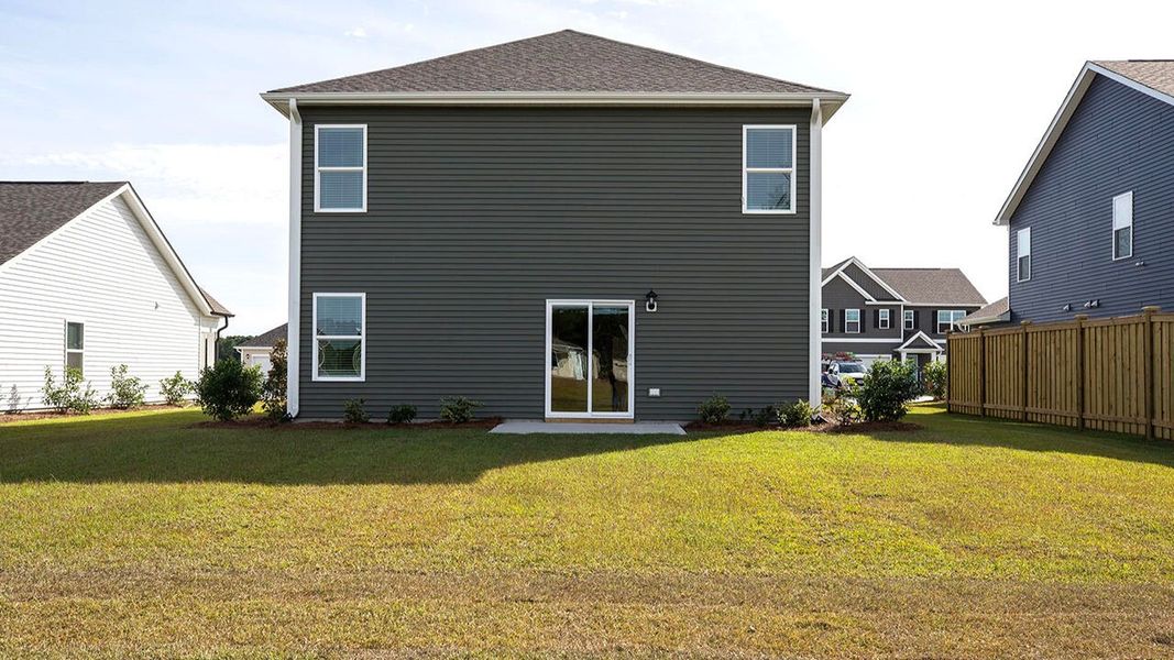 Exterior details and patio area of a home in Sidbury Station, Castle Hayne (Image 4).