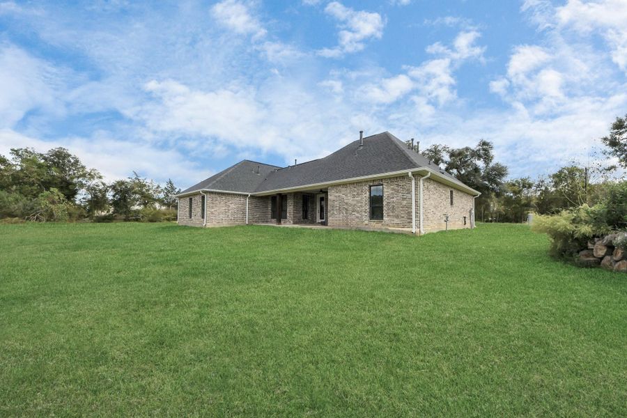 Exterior details and patio area of a home in , Alvin (Image 3). Exterior details and patio area of a home in , Alvin (Image 3).
