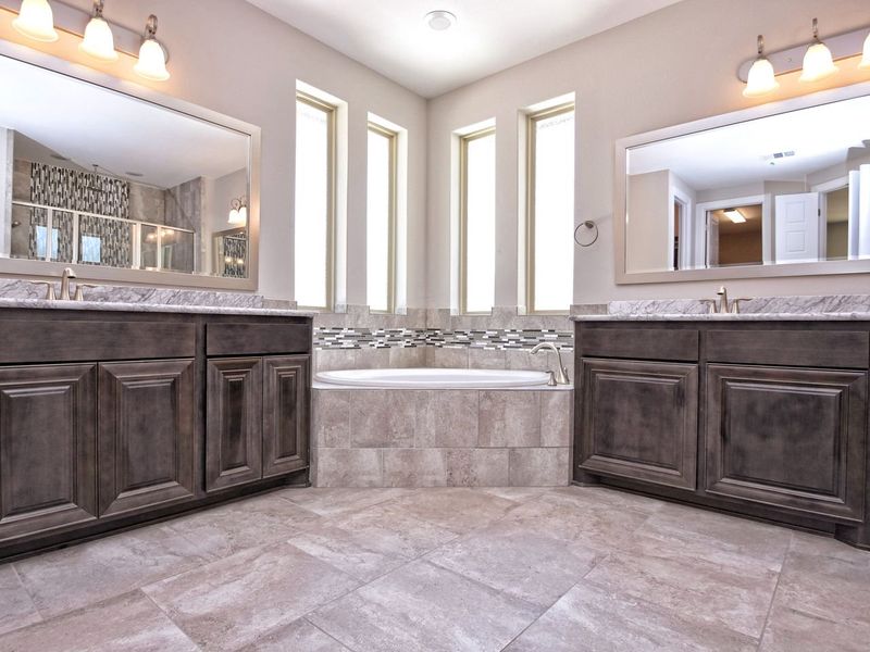 Representative furnished interior of a home built from the San Simeon I by Giddens Homes in Clearwater Ranch, Liberty Hill (Image 274).