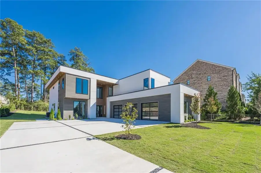 Front exterior of a new home in , Smyrna, GA, highlighting curb appeal (Image 27).