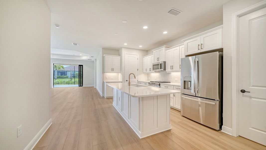 Furnished interior view inside a new home in Vistera of Venice Real Estate and Homes for Sale in Venice, FL - Neal Communities, Venice (Image 7). Furnished interior view inside a new home in Vistera of Venice Real Estate and Homes for Sale in Venice, FL - Neal Communities, Venice (Image 7).