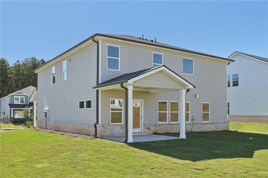 Exterior details and patio area of a home in Parkside at Grayson, Grayson (Image 3).