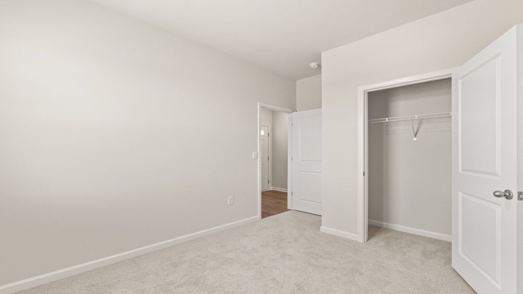 Spacious, unfurnished interior of a new home in Byrd Village, Graniteville (Image 22).