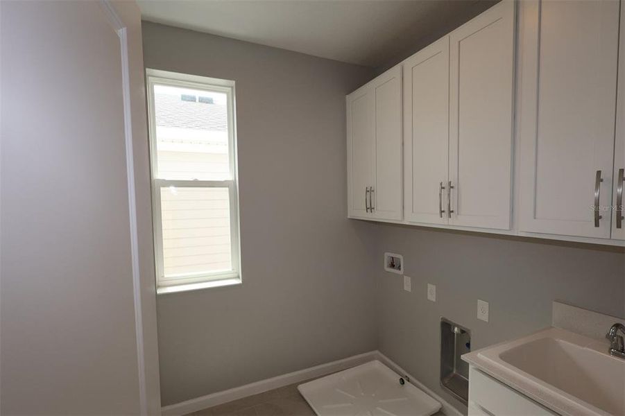 Furnished interior view inside a new home in Center Lake on the Park, St. Cloud (Image 12).
