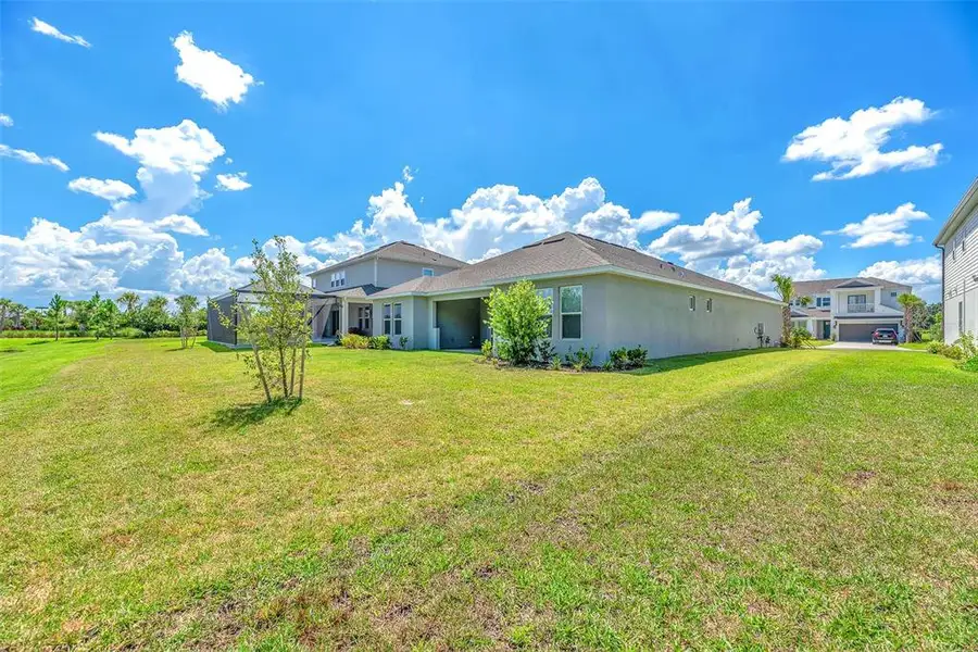 Exterior details and patio area of a home in , Wesley Chapel (Image 3).