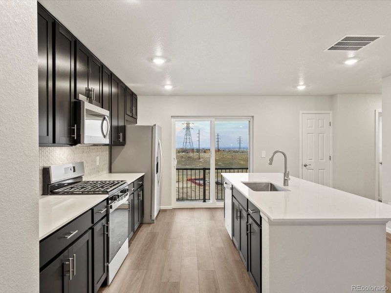 Furnished interior view inside a new home in Three Hills, Morrison (Image 6). Furnished interior view inside a new home in Three Hills, Morrison (Image 6).