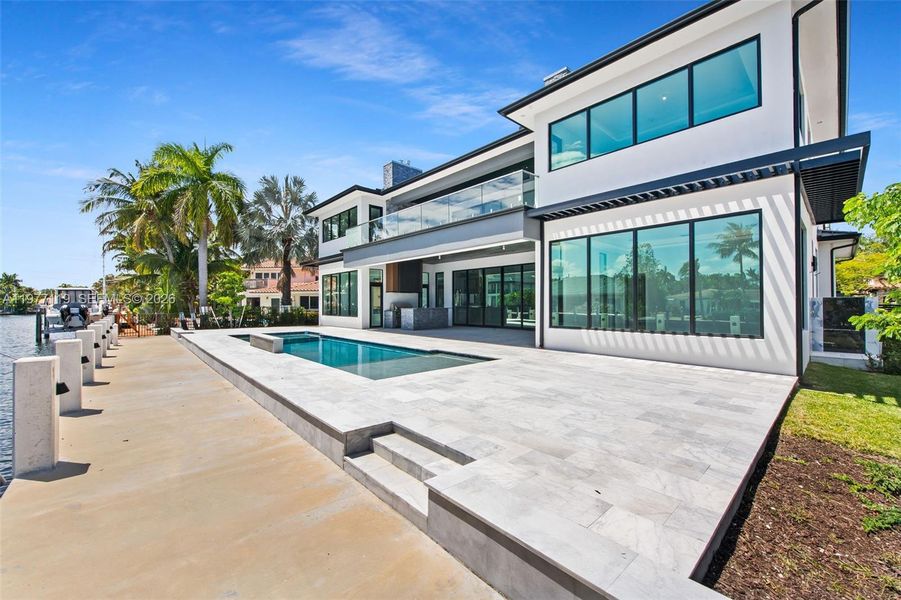 Exterior details and patio area of a home in , Fort Lauderdale (Image 15).