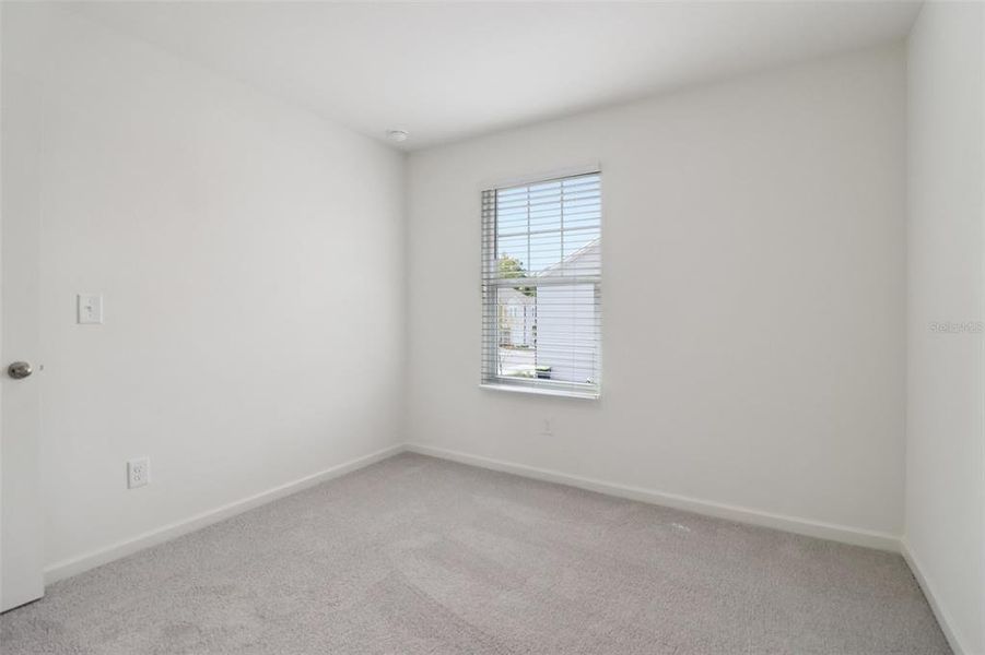 Spacious, unfurnished interior of a new home in Temples Crossing, Davenport (Image 28).