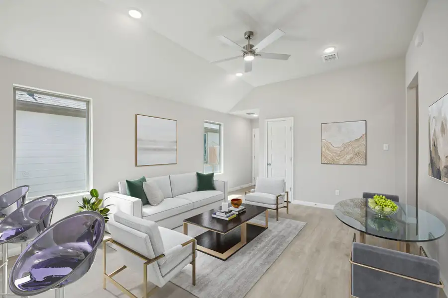 Living room with light wood-style flooring, lofted ceiling, a ceiling fan, and recessed lighting