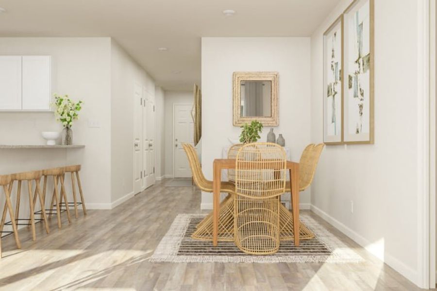 A dining room with a table and chairs. A dining room with a table and chairs.