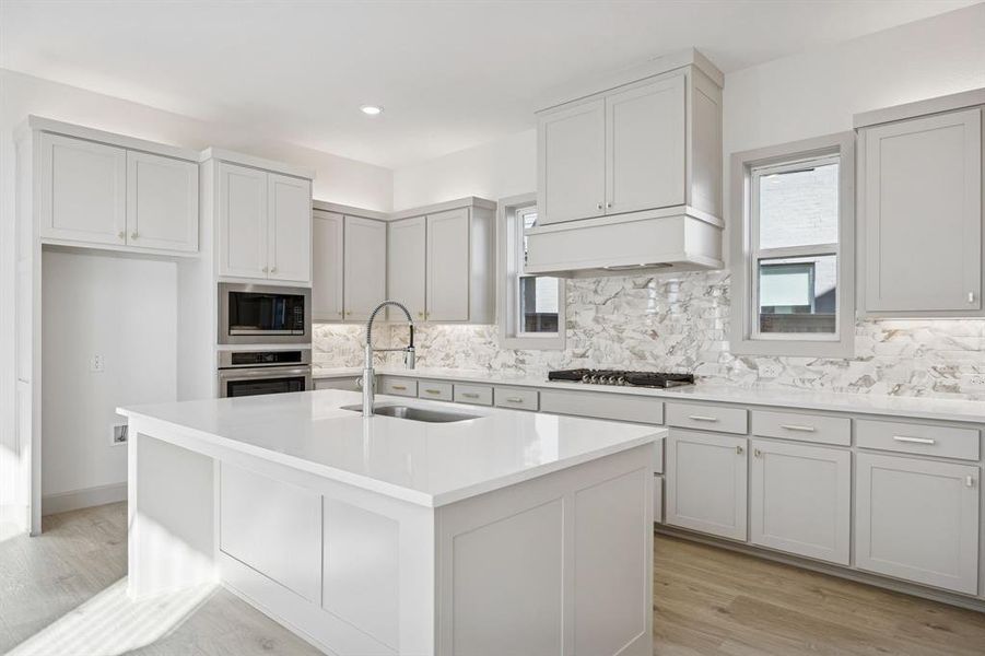 Beautiful cabinetry and gorgeous counter tops paired with contemporary stainless steel create a dream kitchen for the ages! Beautiful cabinetry and gorgeous counter tops paired with contemporary stainless steel create a dream kitchen for the ages!
