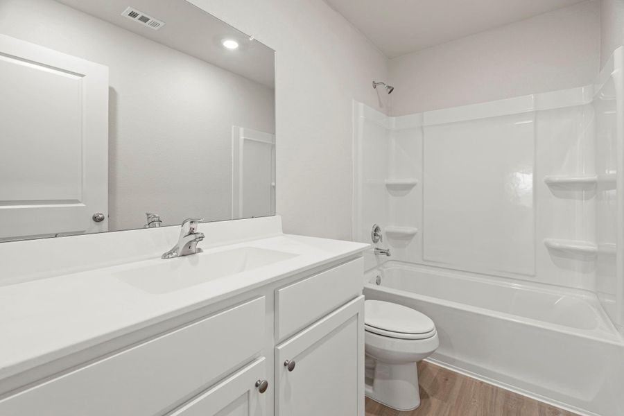 Furnished interior view inside a new home in , Iowa Colony (Image 7).