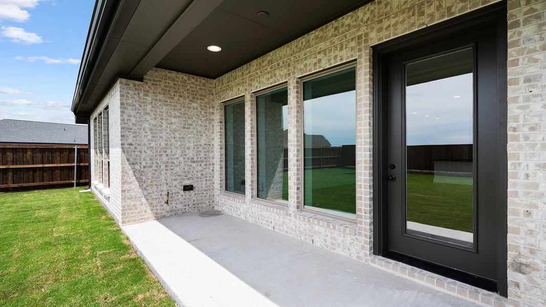 Exterior details and patio area of a home in Meraki, Forney (Image 2). Exterior details and patio area of a home in Meraki, Forney (Image 2).
