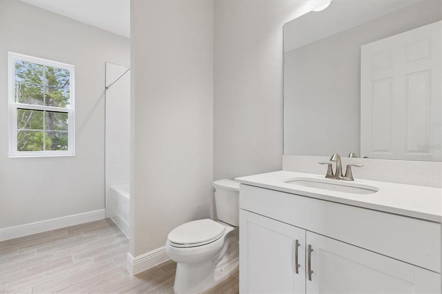 Furnished interior view inside a new home in Caldera, Spring Hill (Image 7).