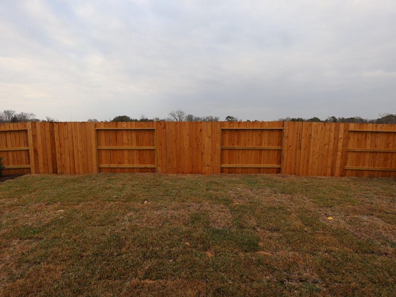 Exterior details and patio area of a home in Ambrose, La Marque (Image 3).