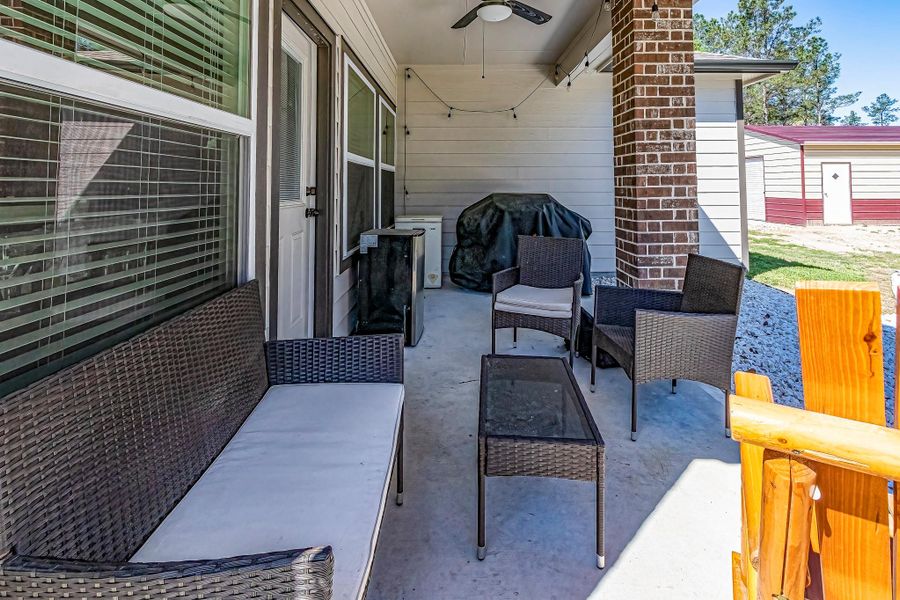 Exterior details and patio area of a home in , Conroe (Image 30).