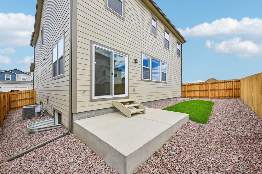 Exterior details and patio area of a home in Ridge at Lorson Ranch, Colorado Springs (Image 3). Exterior details and patio area of a home in Ridge at Lorson Ranch, Colorado Springs (Image 3).