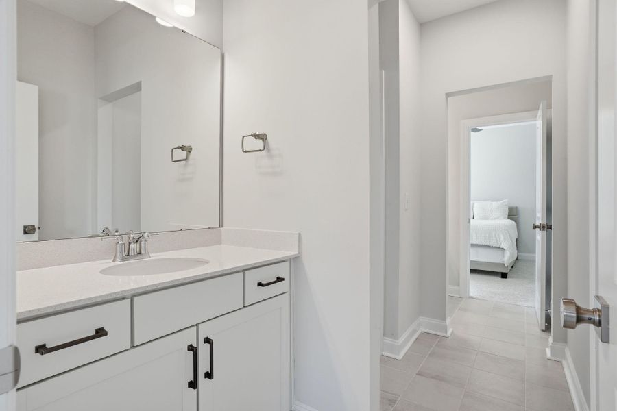 Furnished interior view inside a new home in Tidewater at Lakes of Cane Bay, Summerville (Image 45).