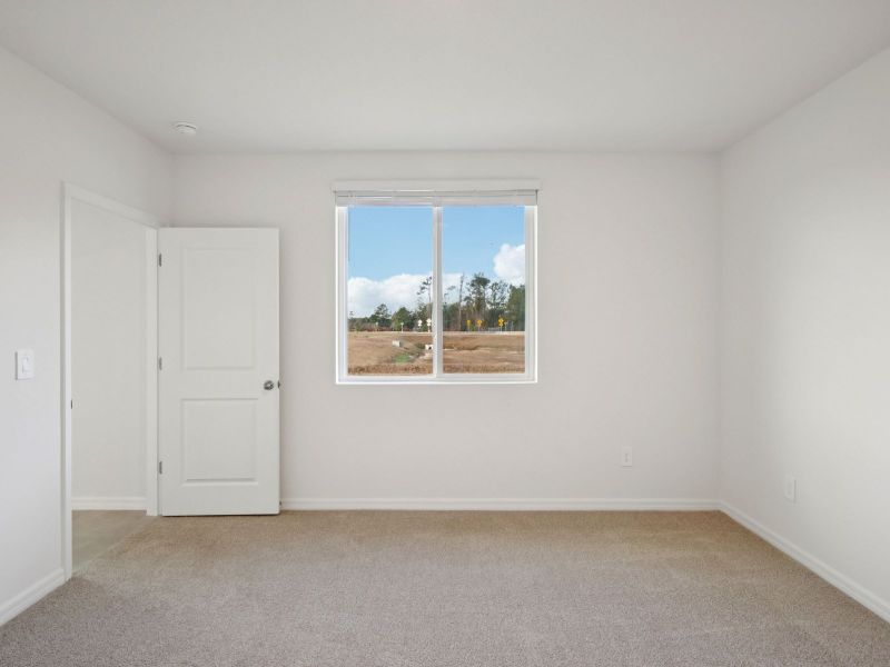 Spacious, unfurnished interior of a new home in Salt Meadows - Premier Series, Parrish (Image 11).