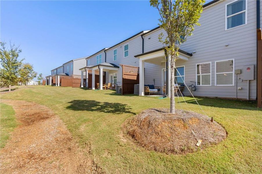 Exterior details and patio area of a home in Willowcrest Townhomes, Mableton (Image 26).