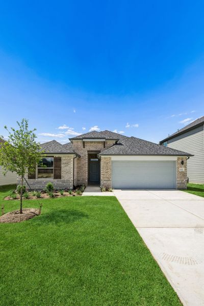 Front exterior of a new home in Riviera Pines, Huffman, TX, highlighting curb appeal (Image 2). Front exterior of a new home in Riviera Pines, Huffman, TX, highlighting curb appeal (Image 2).