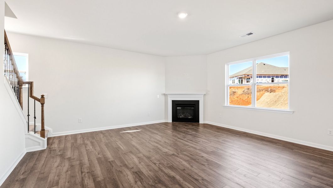 Representative unfurnished interior of a home built from the WILMINGTON by D.R. Horton in Benjamin's Grove, Woodruff (Image 21).