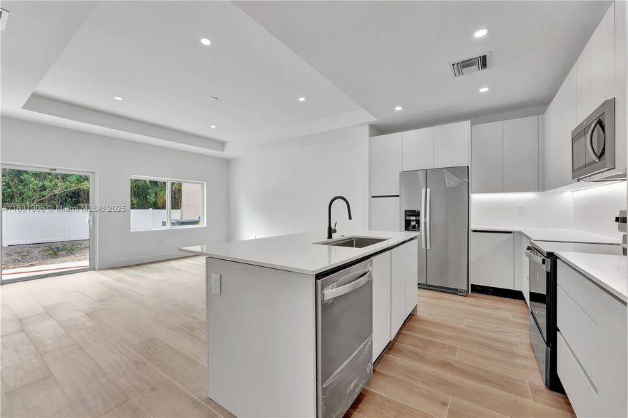 Furnished interior view inside a new home in , Coral Springs (Image 8).