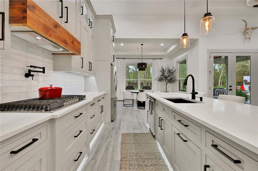 Breakfast, lunch and dinner will be a dream in this chef kitchen! Quartz counters, pot filler, soft close Shaker cabinets and drawers. Refrigerator is included.