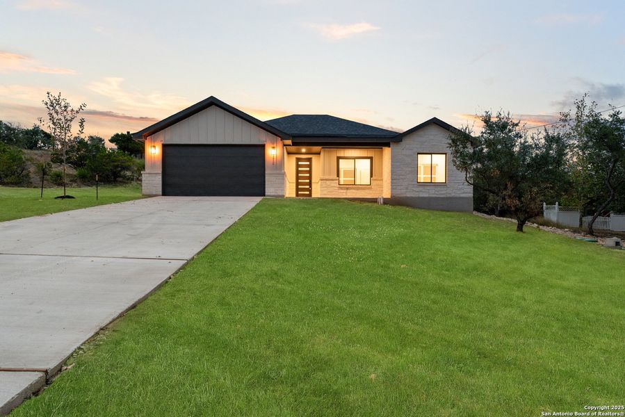 Front exterior of a new home in , San Antonio, TX, highlighting curb appeal (Image 2).