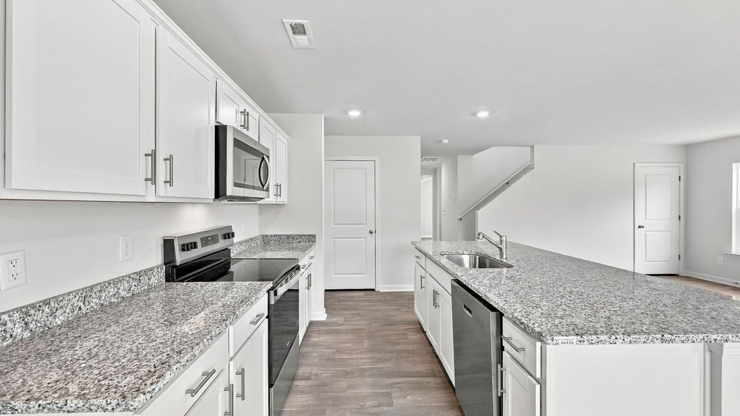 Furnished interior view inside a new home in Bynum Farms, Farmville (Image 4).
