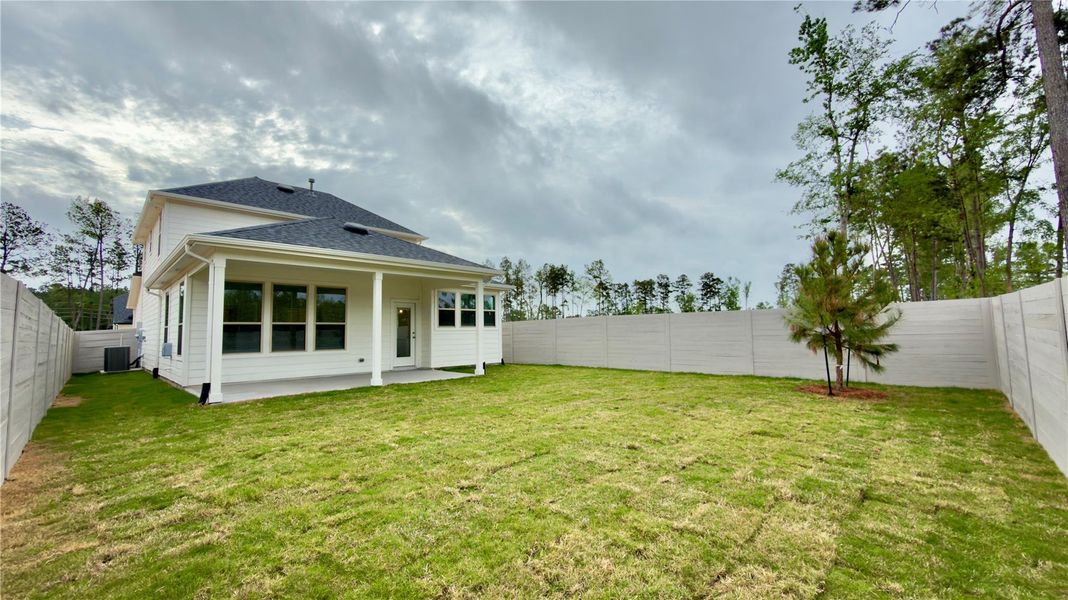Exterior details and patio area of a home in Pulte Homes at Two Step Farm, Montgomery (Image 3).
