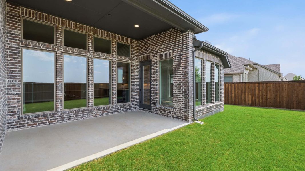 Exterior details and patio area of a home in Myrtle Creek, Waxahachie (Image 4). Exterior details and patio area of a home in Myrtle Creek, Waxahachie (Image 4).