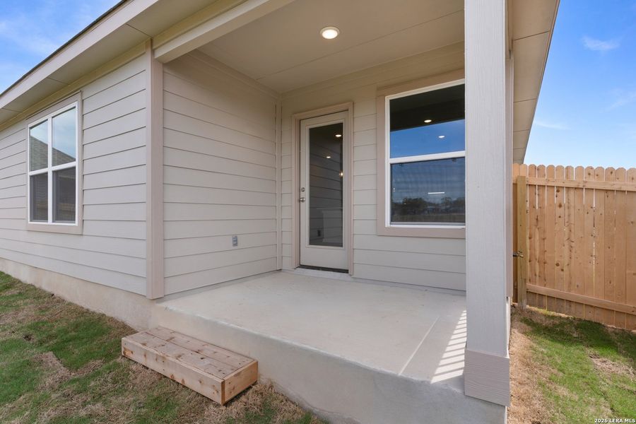 Exterior details and patio area of a home in Prairie Green, Converse (Image 14).